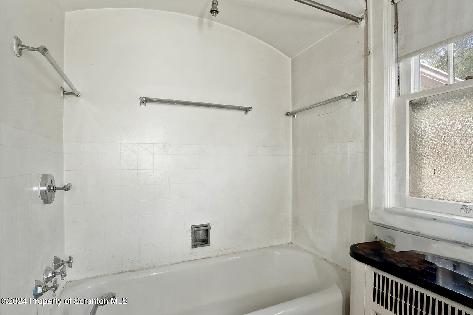 266 Old State Road Falls, PA 18615 - Photo 24 of 36 a bathroom with a bathtub and shower