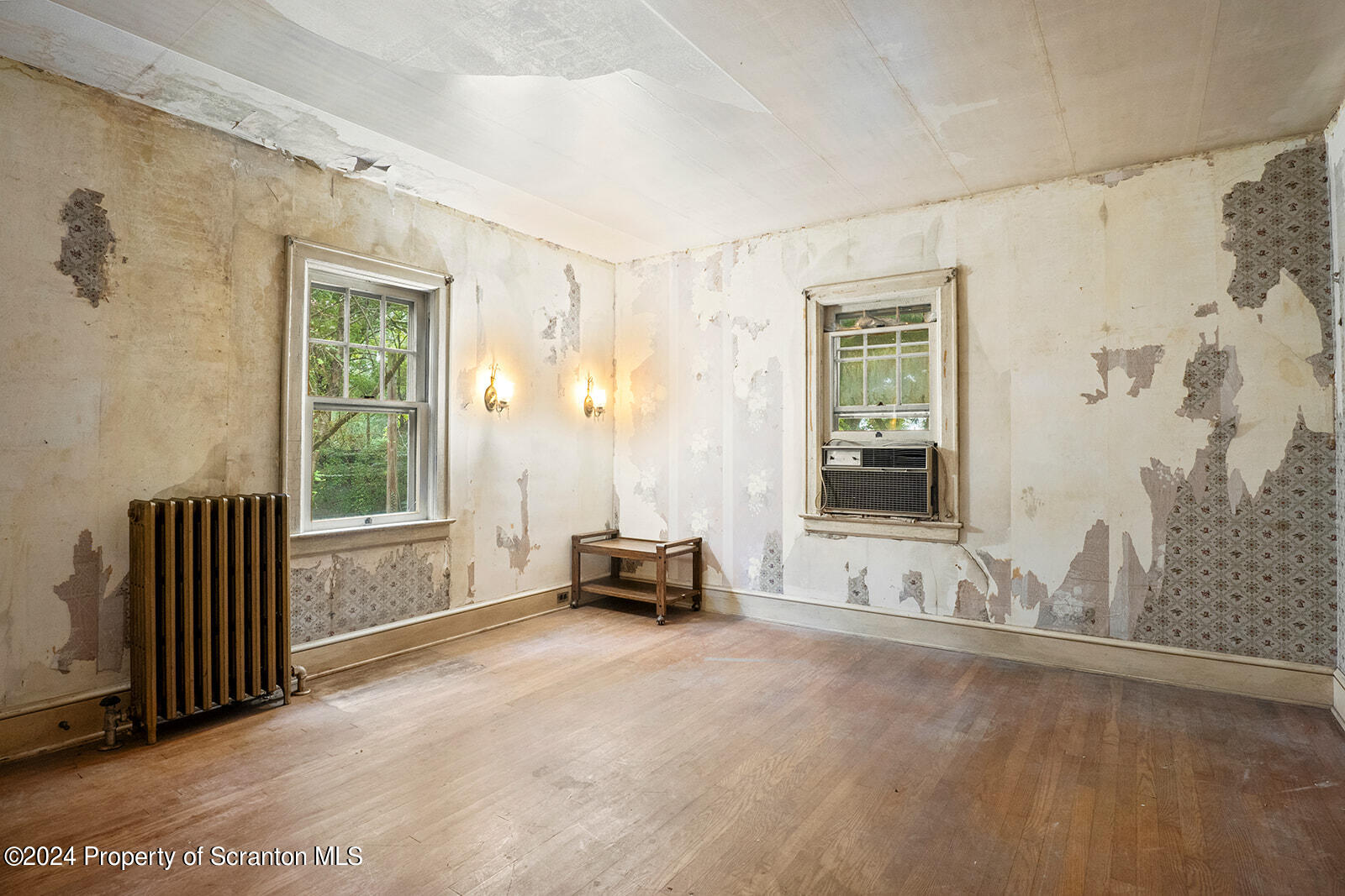 266 Old State Road Falls, PA 18615 - Photo 25 of 36 a living room with furniture and a window