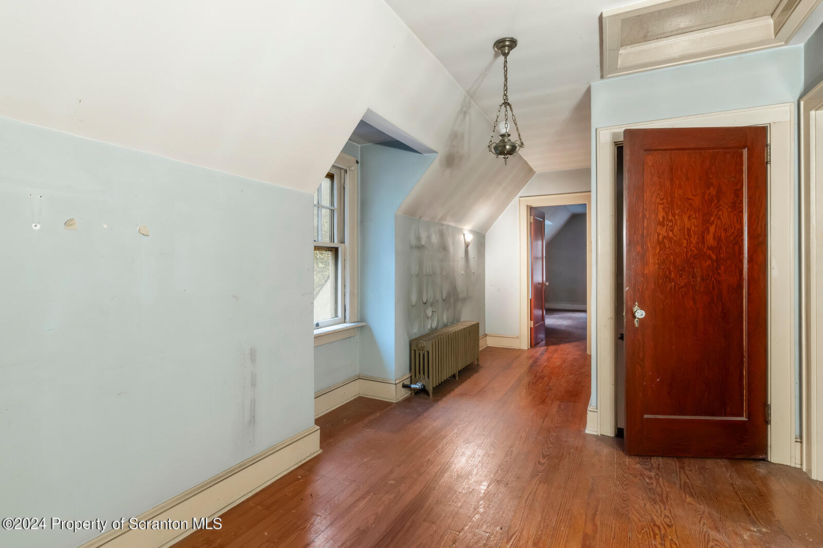 266 Old State Road Falls, PA 18615 - Photo 32 of 36 wooden floor in an empty room