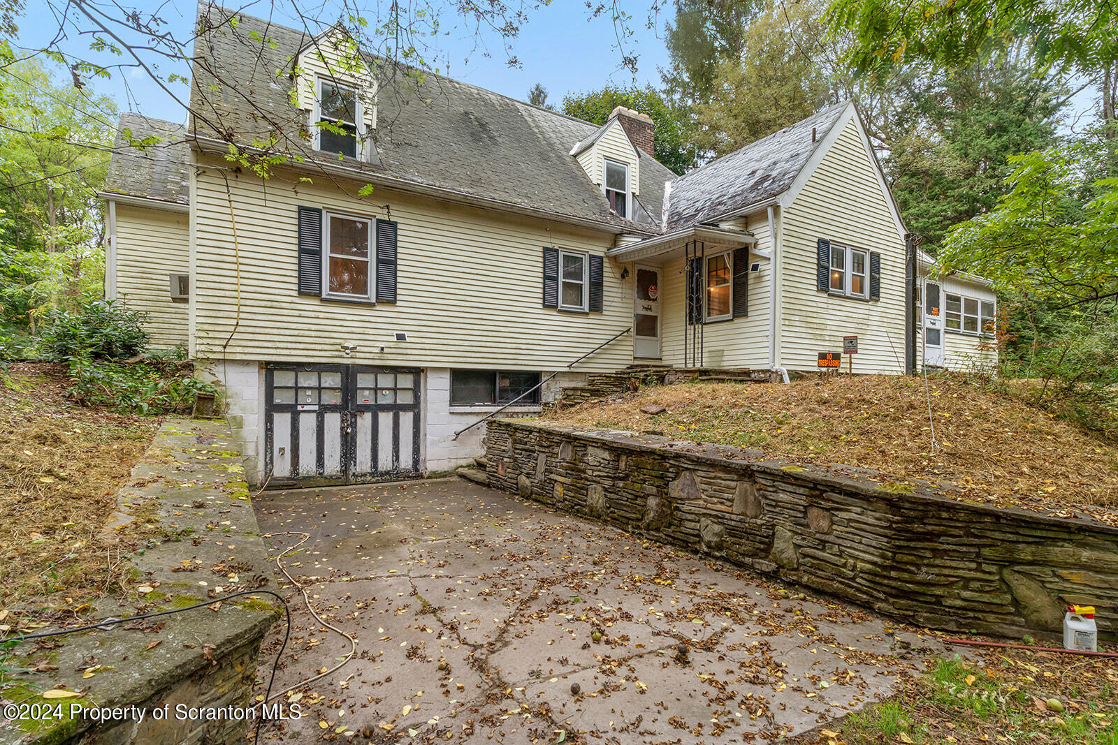 266 Old State Road Falls, PA 18615 - Photo 4 of 36 a view of a house with wooden fence