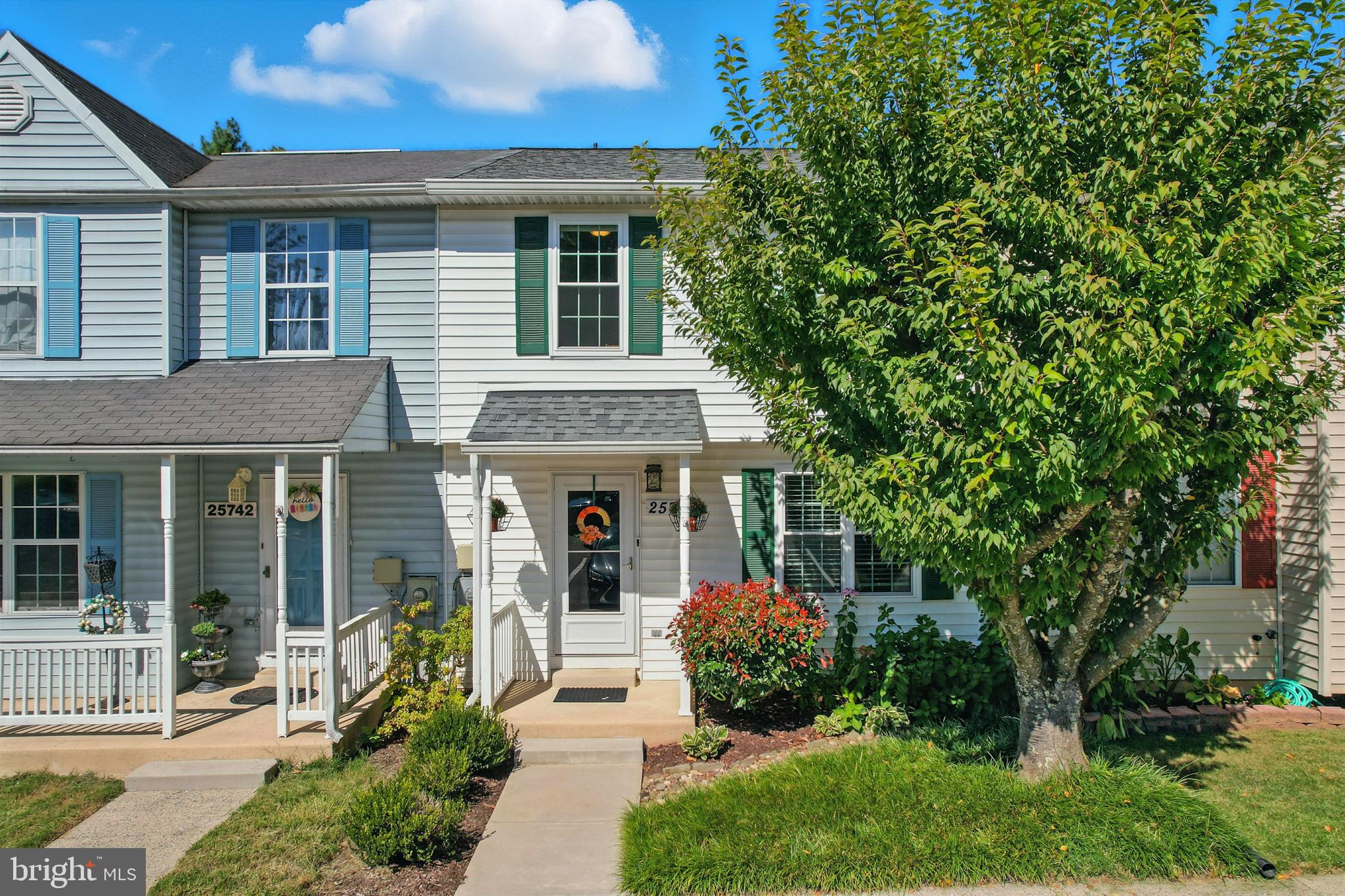 25744 Woodfield Road Damascus, MD 20872 - Photo 1 of 43 Charming townhouse with vibrant landscaping.