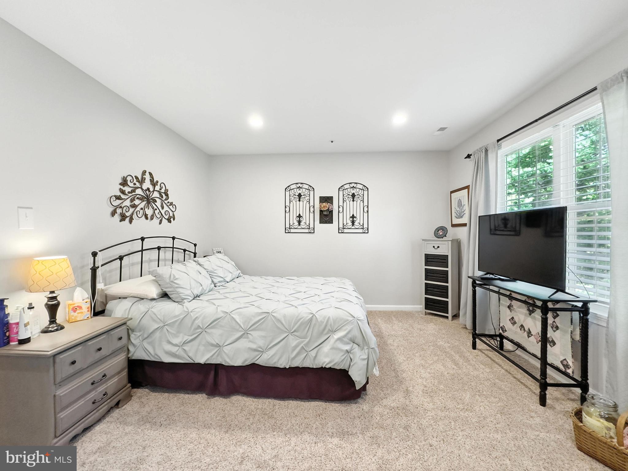 25744 Woodfield Road Damascus, MD 20872 - Photo 21 of 43 Serene bedroom with natural light and charm.