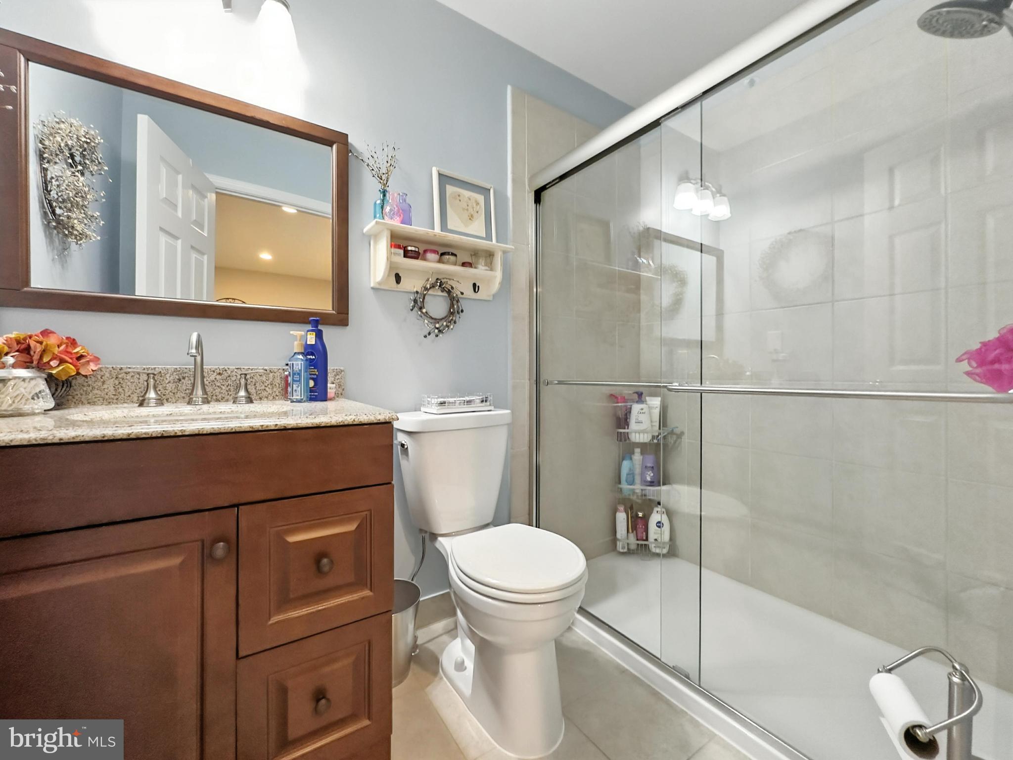 25744 Woodfield Road Damascus, MD 20872 - Photo 24 of 43 Modern bathroom with elegant finishes.