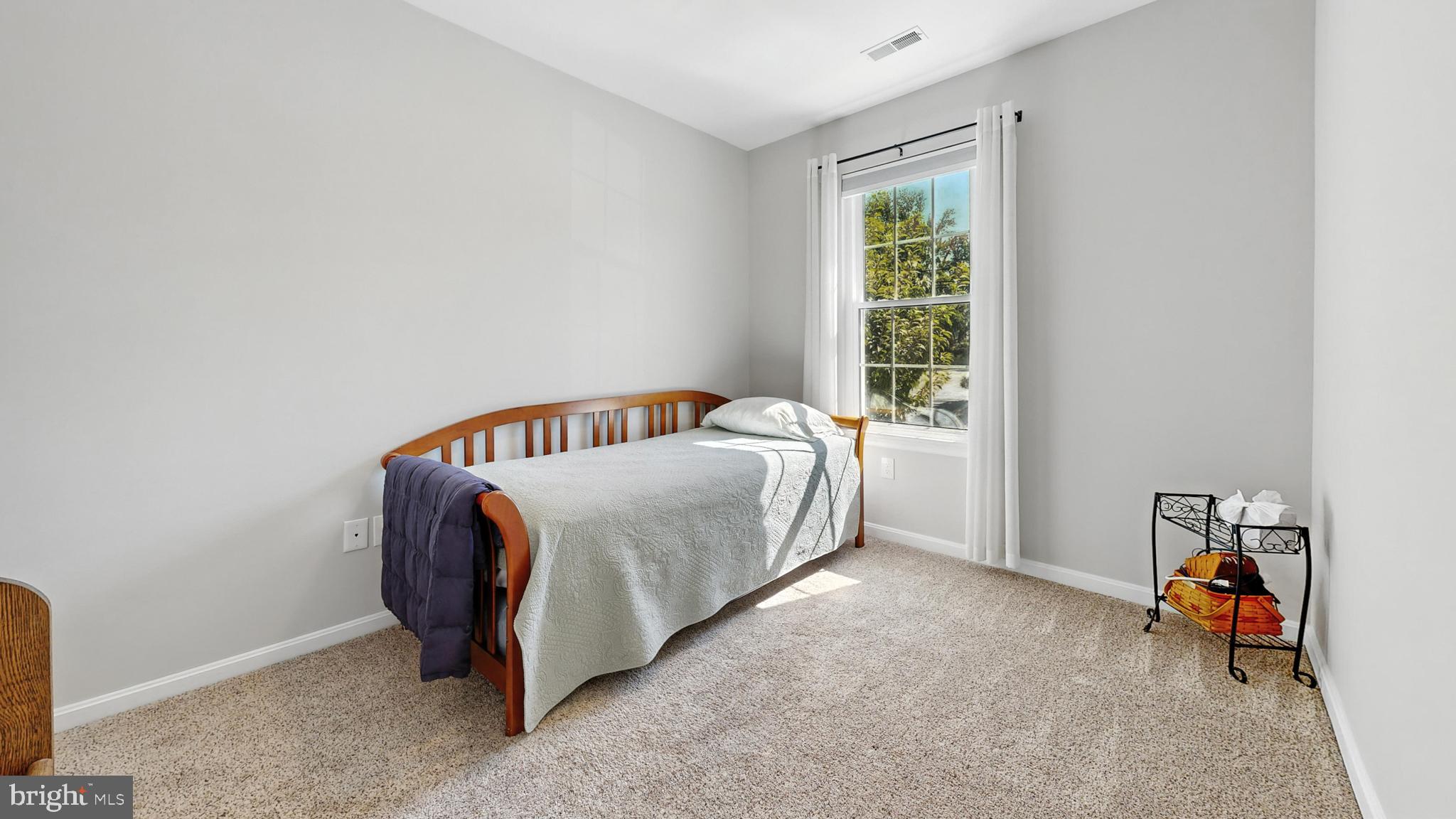 25744 Woodfield Road Damascus, MD 20872 - Photo 26 of 43 Bright and inviting bedroom with natural light.