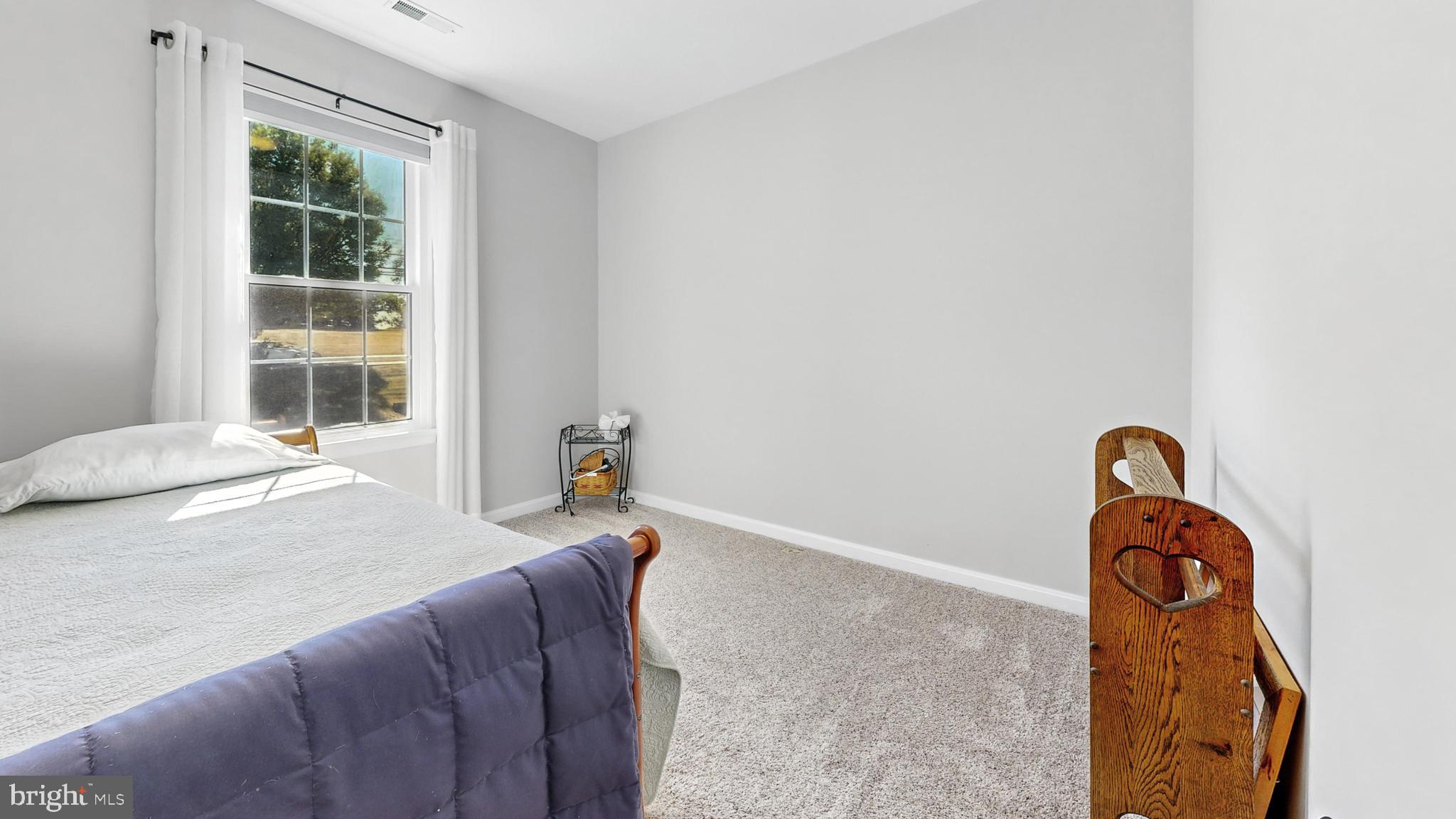 25744 Woodfield Road Damascus, MD 20872 - Photo 27 of 43 Bright and airy bedroom with natural light.