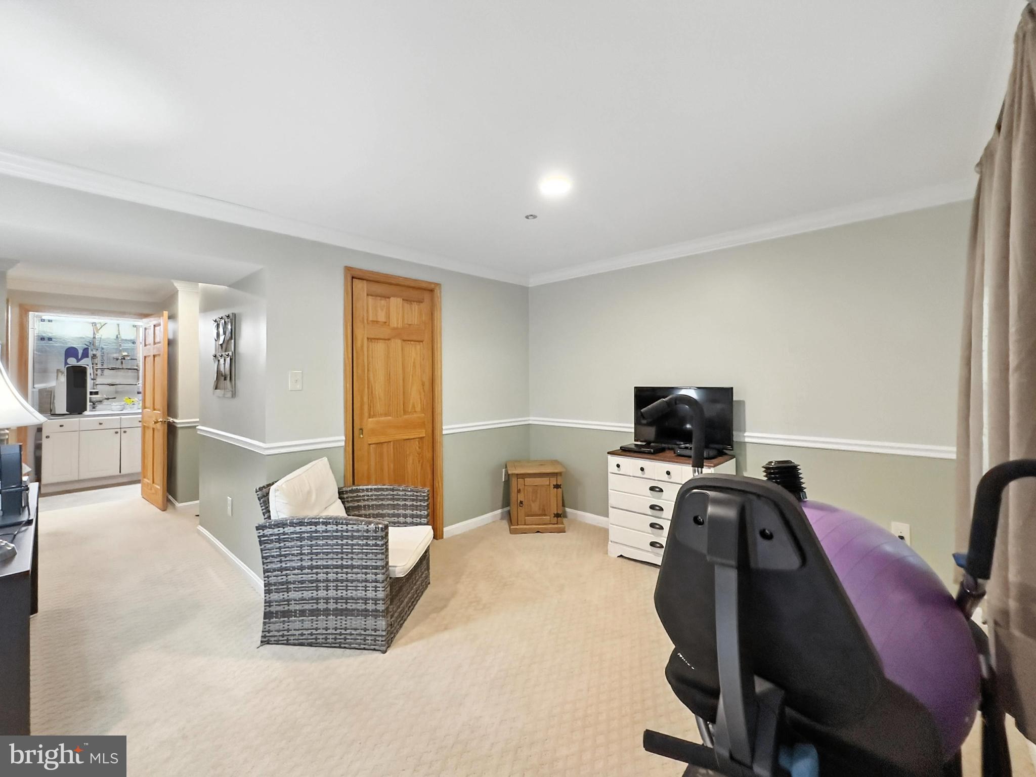 25744 Woodfield Road Damascus, MD 20872 - Photo 32 of 43 Versatile space for relaxation or work.