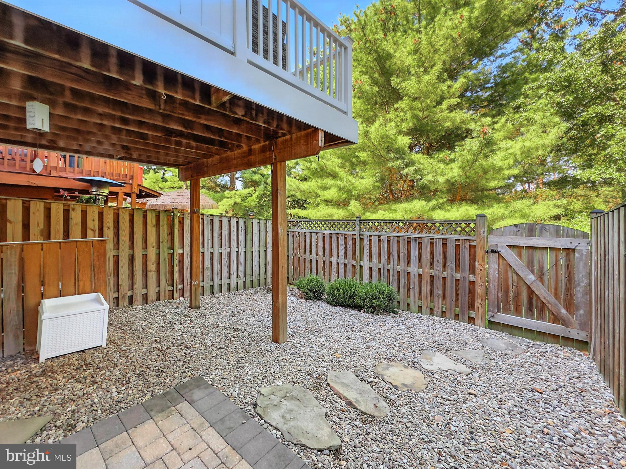 25744 Woodfield Road Damascus, MD 20872 - Photo 38 of 43 Charming outdoor retreat with serene landscaping.
