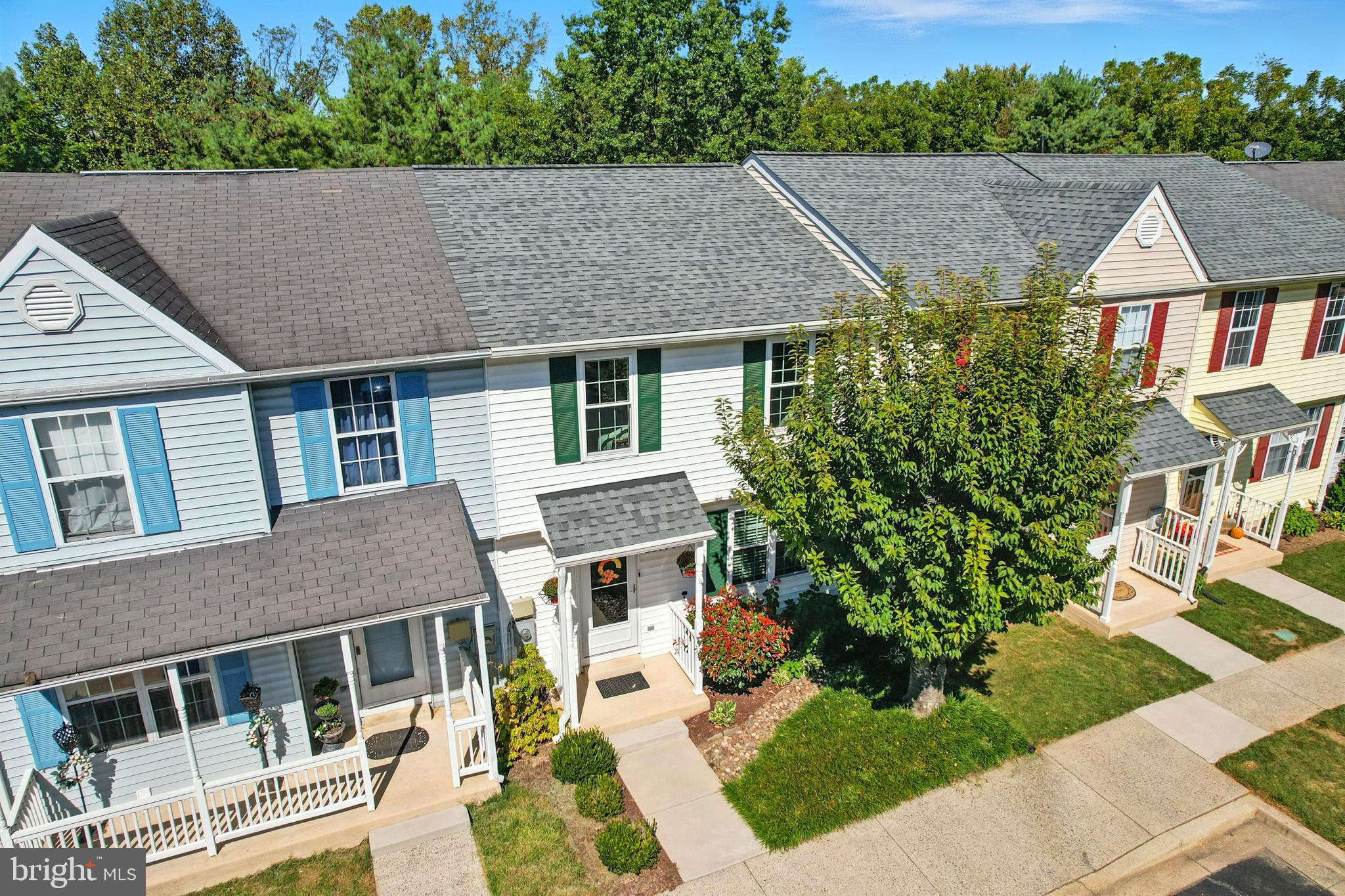 25744 Woodfield Road Damascus, MD 20872 - Photo 5 of 43 Charming townhomes with vibrant facades.