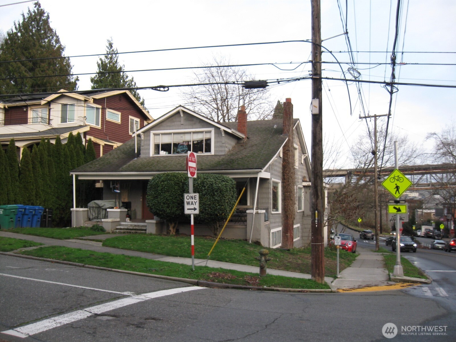 4002 2nd Avenue Northeast Seattle, WA 98105 - Photo 1 of 16 a view of a house with a patio and a yard