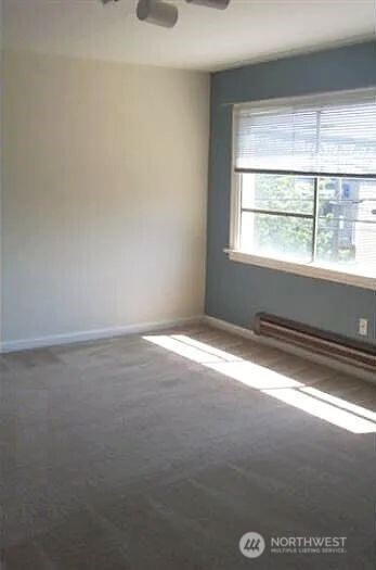 4002 2nd Avenue Northeast Seattle, WA 98105 - Photo 7 of 16 a view of empty room with window