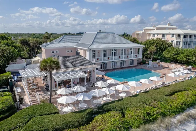 an aerial view of a house with garden