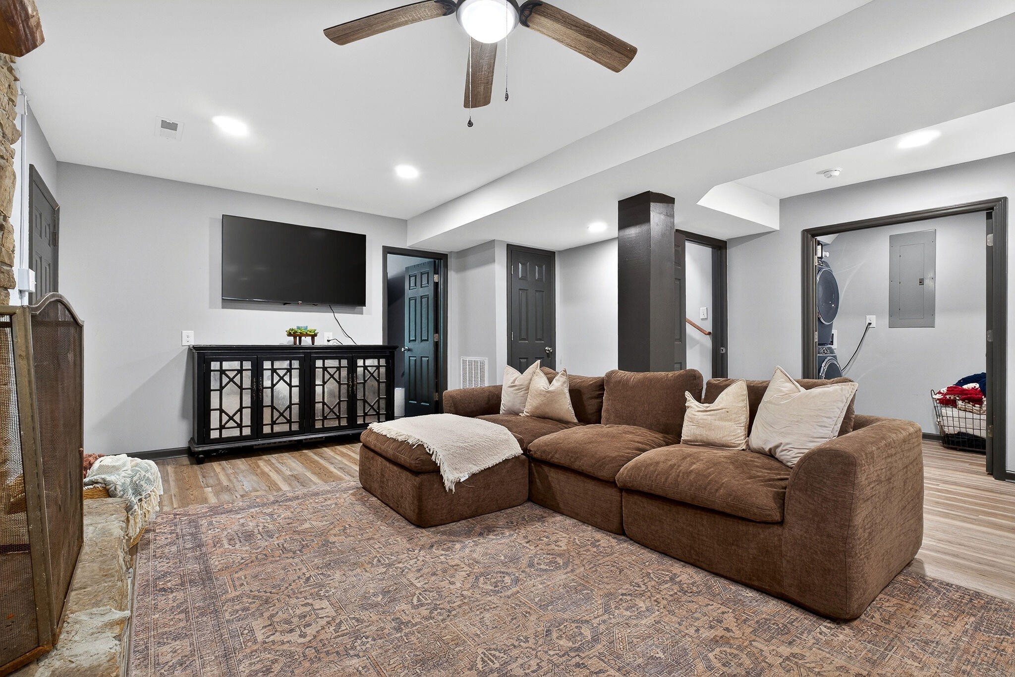 9388 Harrison Ferry Road McMinnville, TN 37110 - Photo 19 of 41 a living room with furniture and a flat screen tv