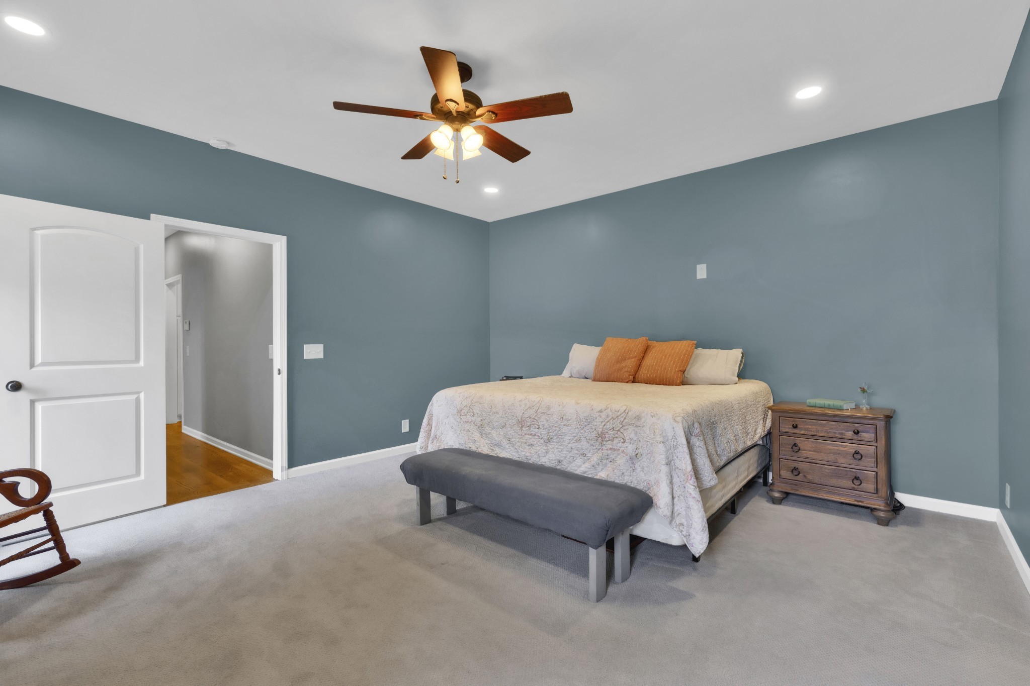3988 Fykes Grove Road Cedar Hill, TN 37032 - Photo 22 of 50 a bedroom with a bed and a chandelier