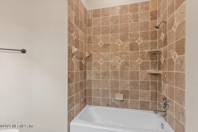 a bathroom with a bathtub