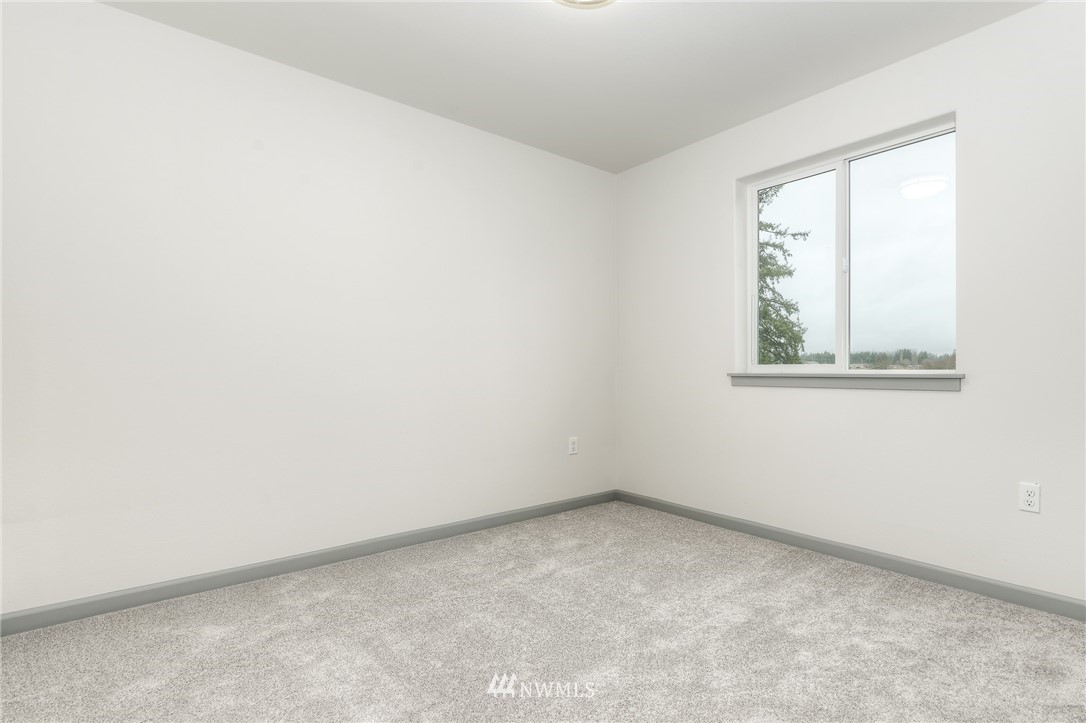 18430 Guava Street Southwest Rochester, WA 98579 - Photo 27 of 36 an empty room with a window