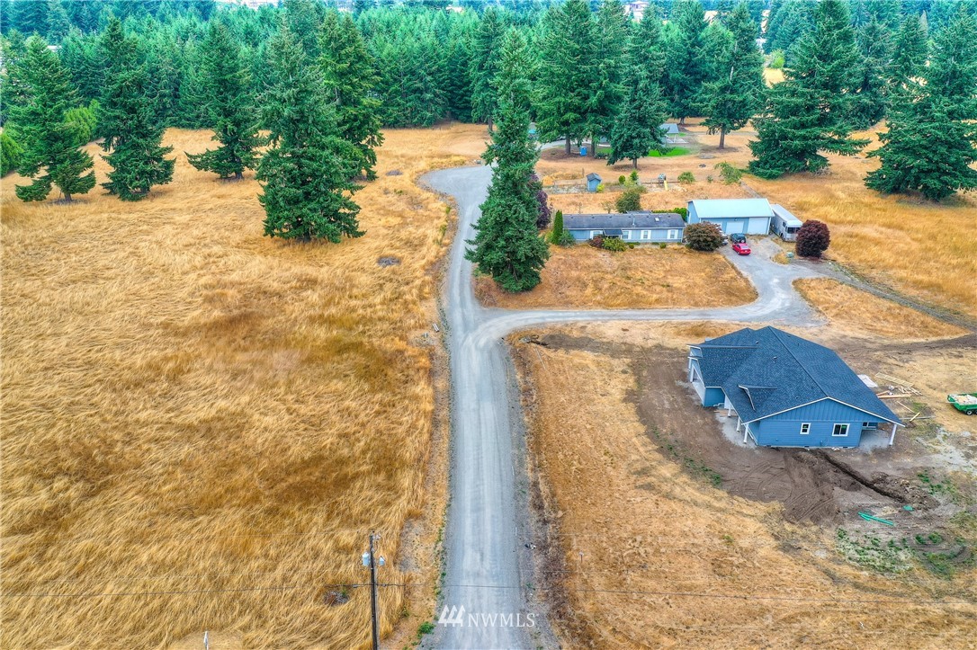 18430 Guava Street Southwest Rochester, WA 98579 - Photo 36 of 36 an aerial view of residential houses with outdoor space
