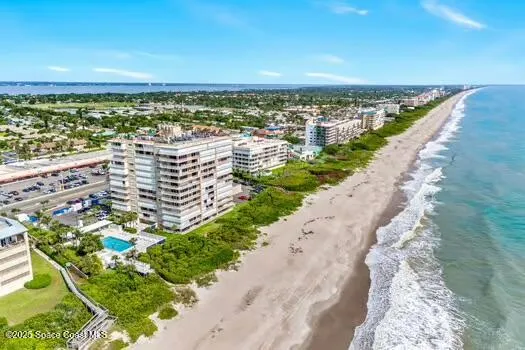 a view of a city and ocean view