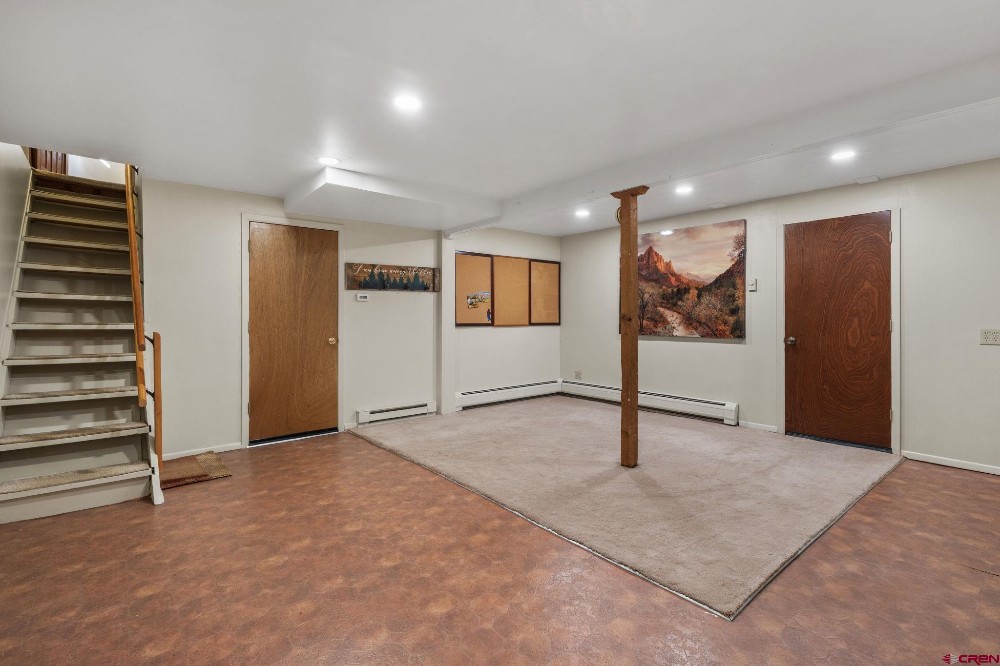 1310 Meadow Road Durango, CO 81303 - Photo 20 of 45 a view of an empty room with stairs