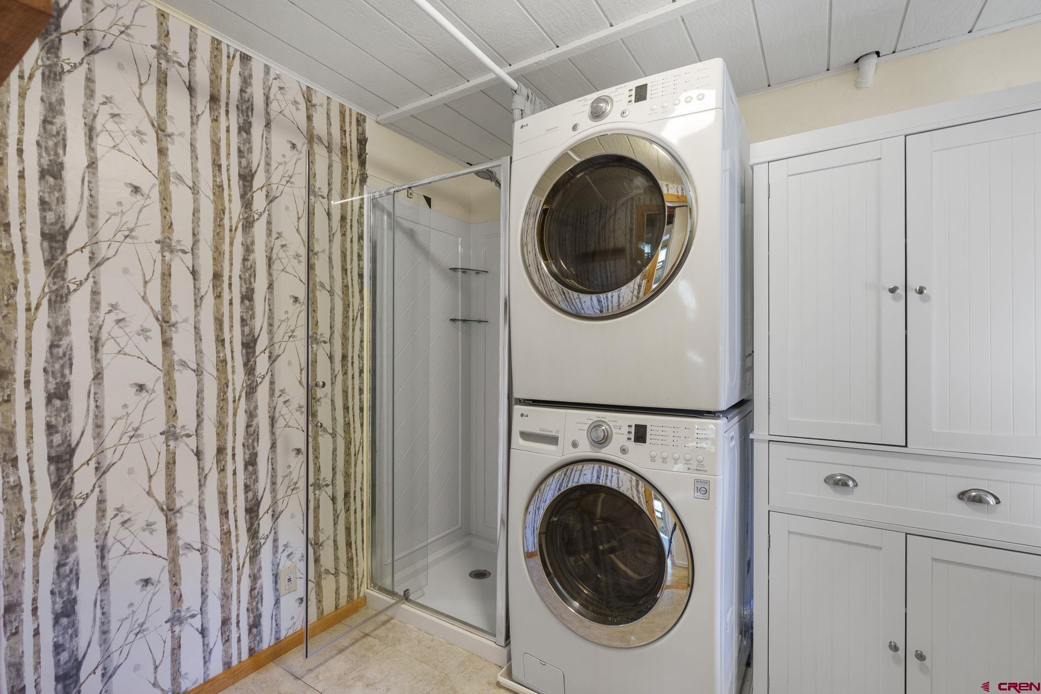 1310 Meadow Road Durango, CO 81303 - Photo 22 of 45 a utility room with dryer and washer