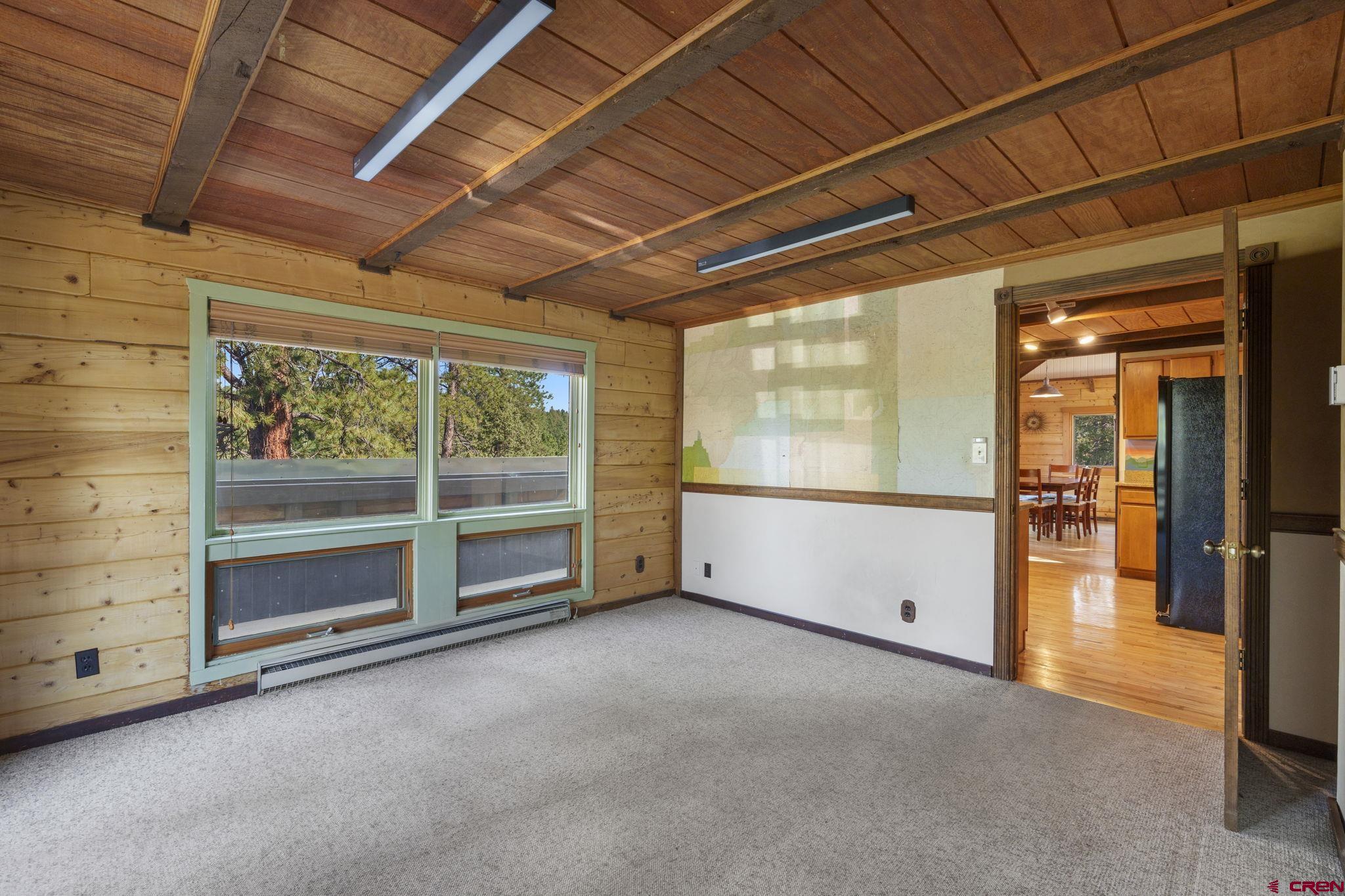 1310 Meadow Road Durango, CO 81303 - Photo 25 of 45 a view of an empty room with a balcony