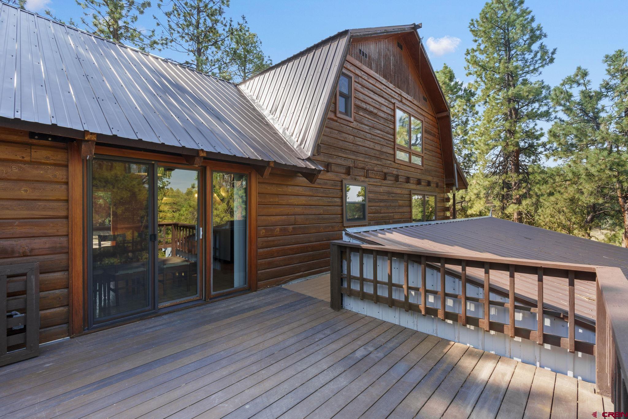 1310 Meadow Road Durango, CO 81303 - Photo 33 of 45 a view of a house with backyard and sitting area