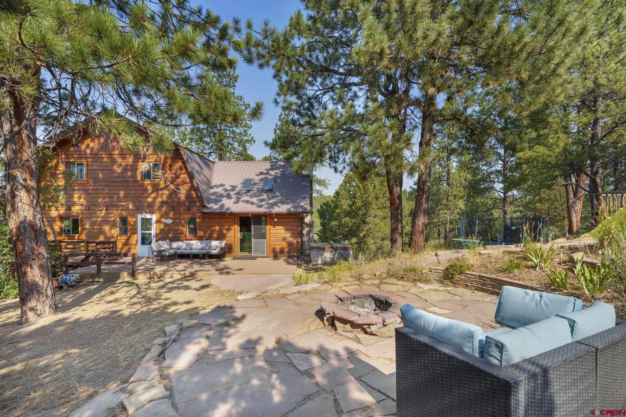 1310 Meadow Road Durango, CO 81303 - Photo 38 of 45 a view of a yard with furniture