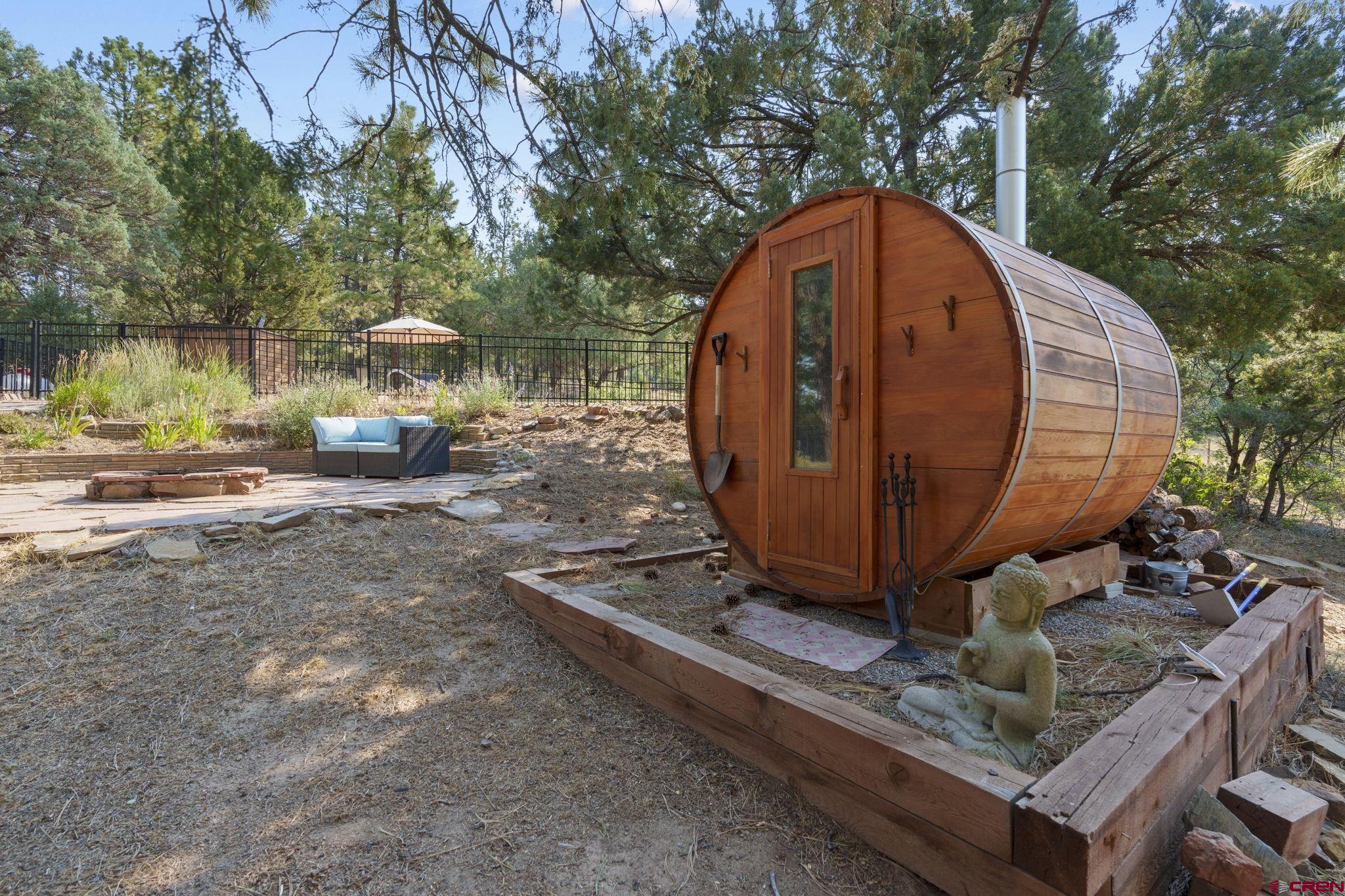 1310 Meadow Road Durango, CO 81303 - Photo 8 of 45 a view of a backyard with sitting area