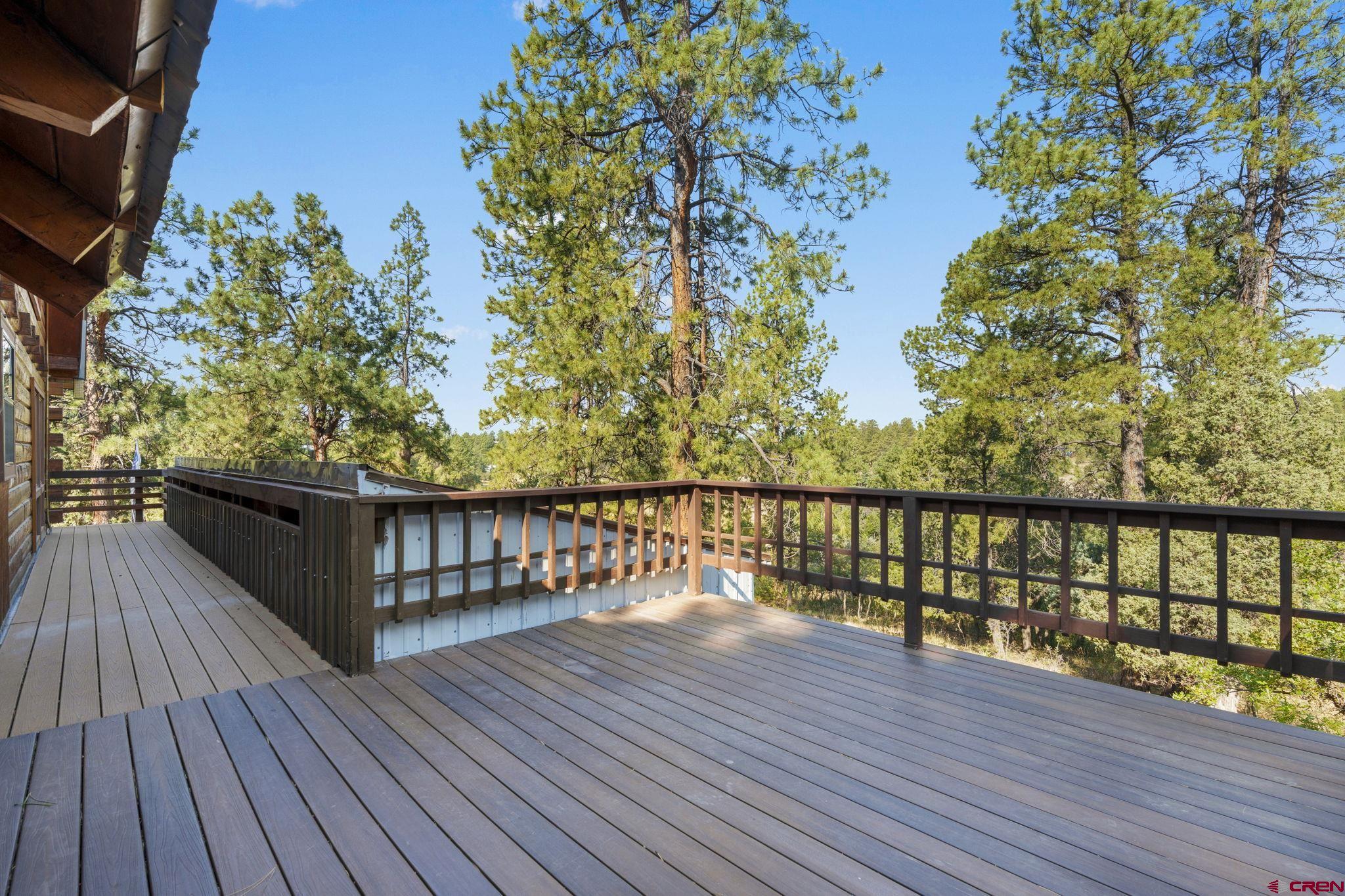 1310 Meadow Road Durango, CO 81303 - Photo 9 of 45 a balcony with wooden floor and fence