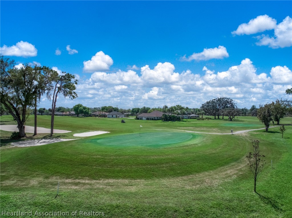4734 Haw Branch Road, Unit 110 Sebring, FL 33875 - Photo 37 of 50 a view of a golf course with a fountain