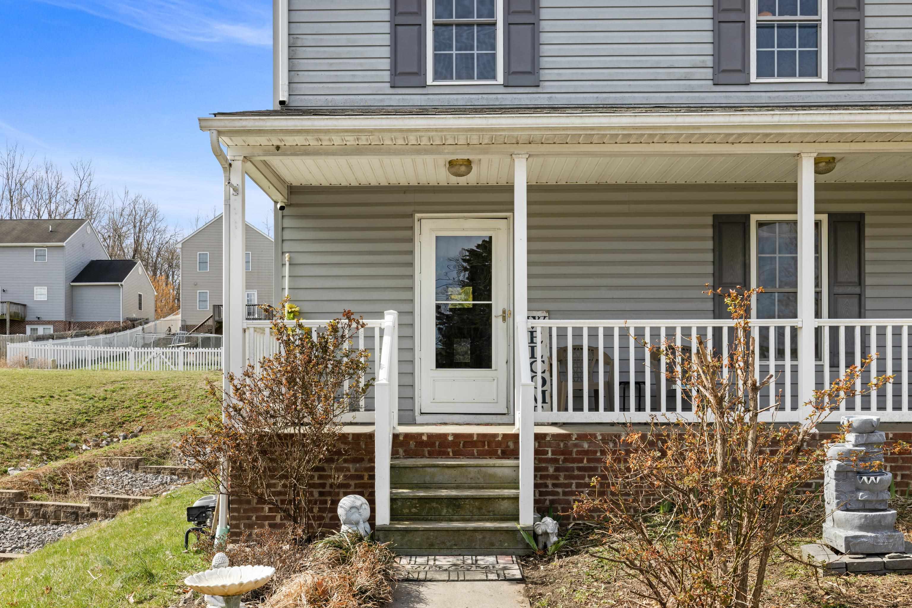 1520 3rd Street Waynesboro, VA 22980 - Photo 5 of 55 a front view of a house with a yard