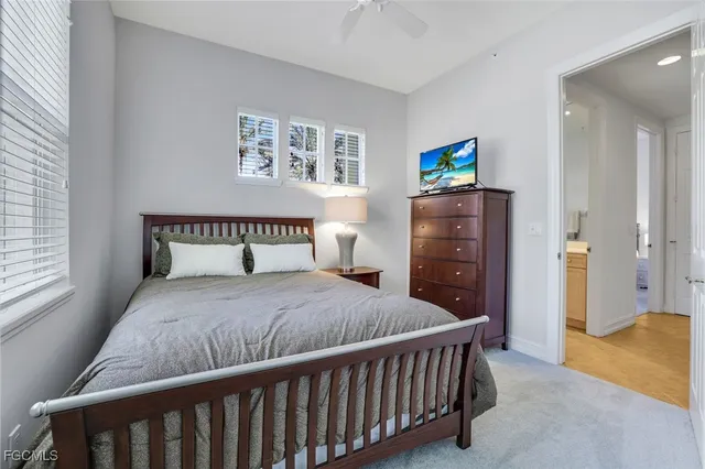 a bedroom with a bed and furniture