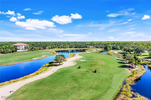 a view of a lake with a big yard