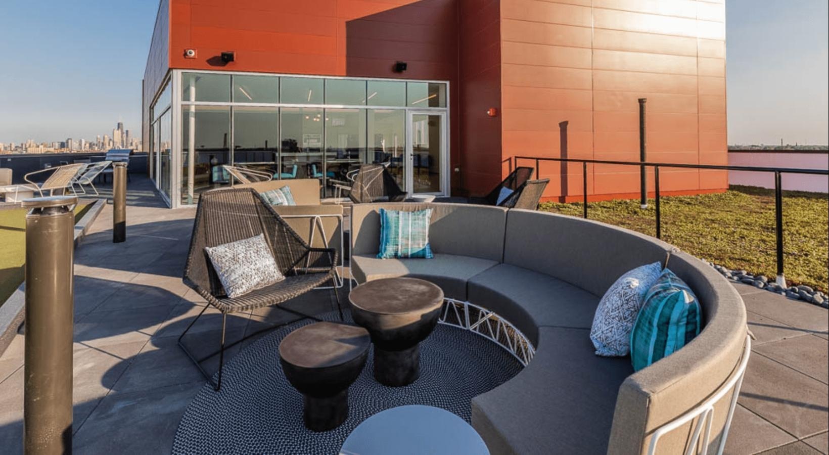 1920 North Milwaukee Avenue, Unit 407 Chicago, IL 60647 - Photo 19 of 19 a living room with furniture and a large window