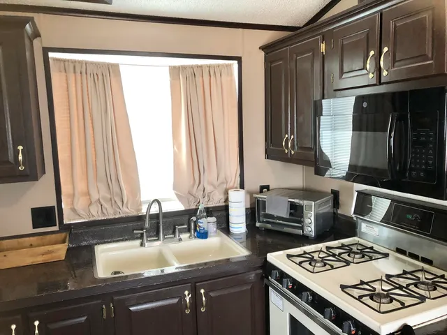 a bedroom with a bed with the view of bedroom