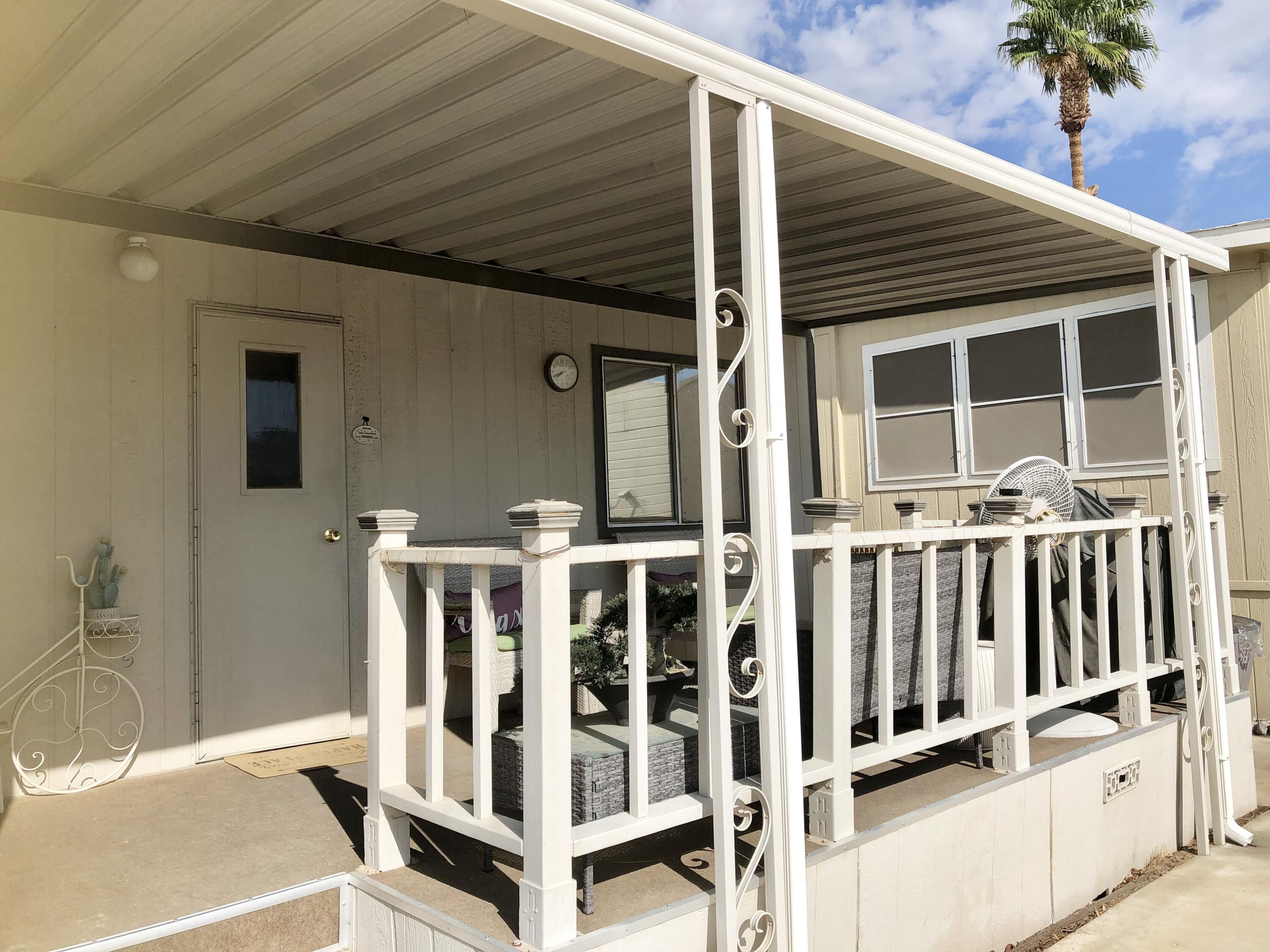 74711 Dillon Road Desert Hot Springs, CA 92241 - Photo 5 of 48 a view of a balcony with door