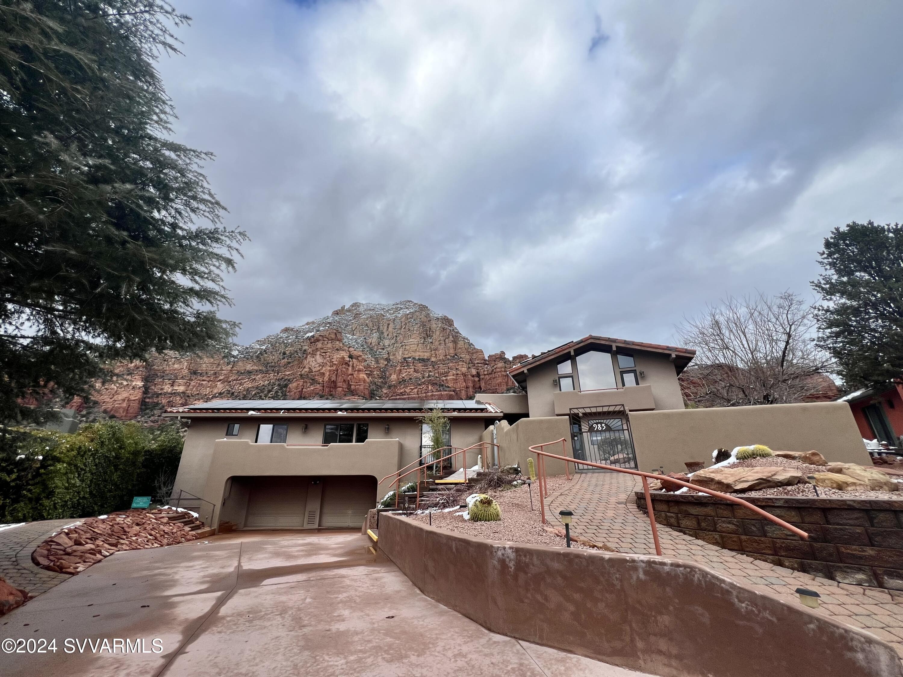 985 Rodeo Road Sedona, AZ 86336 - Photo 12 of 12 an aerial view of a house with a yard