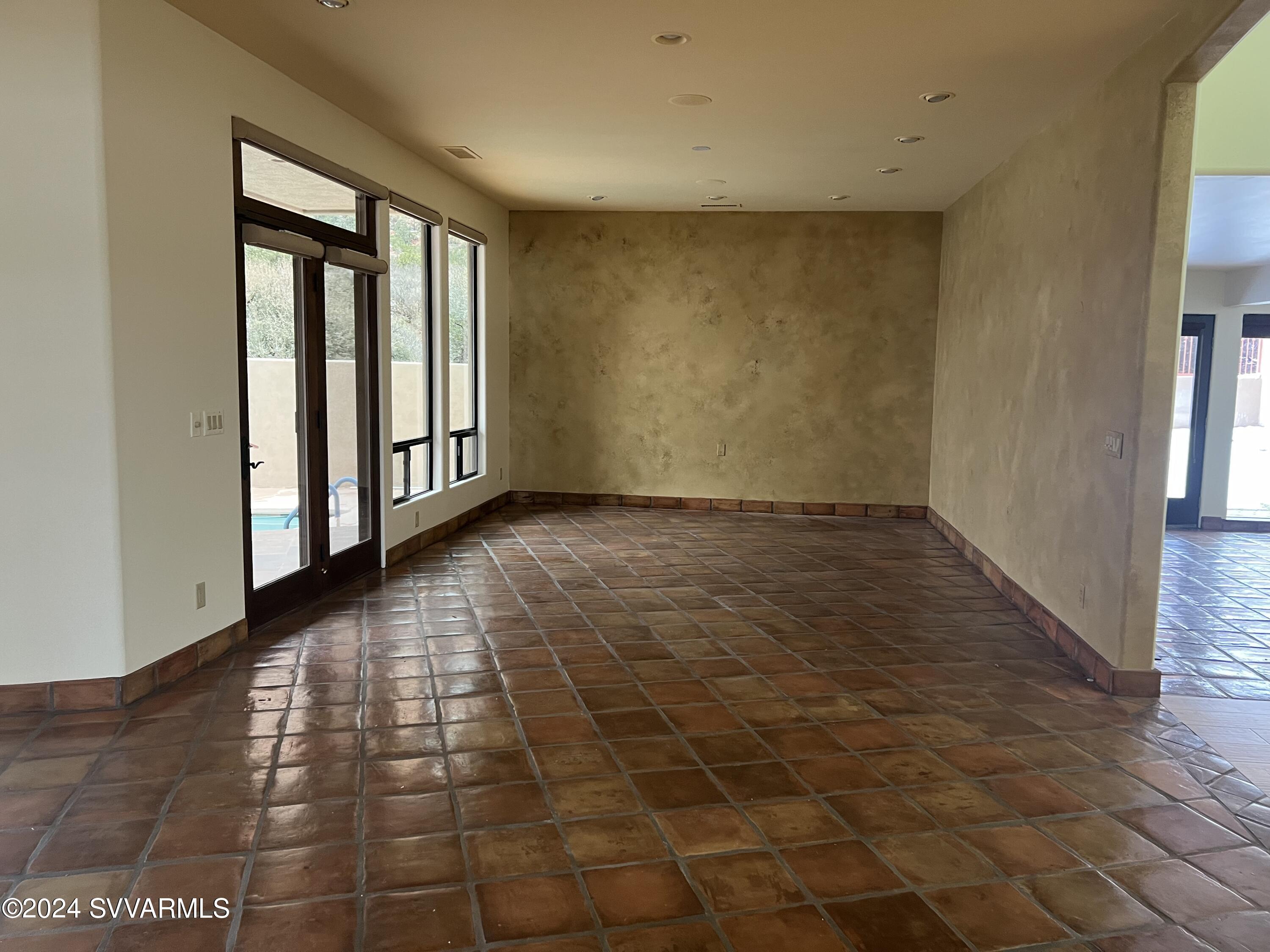 985 Rodeo Road Sedona, AZ 86336 - Photo 3 of 12 a view of an empty room and window