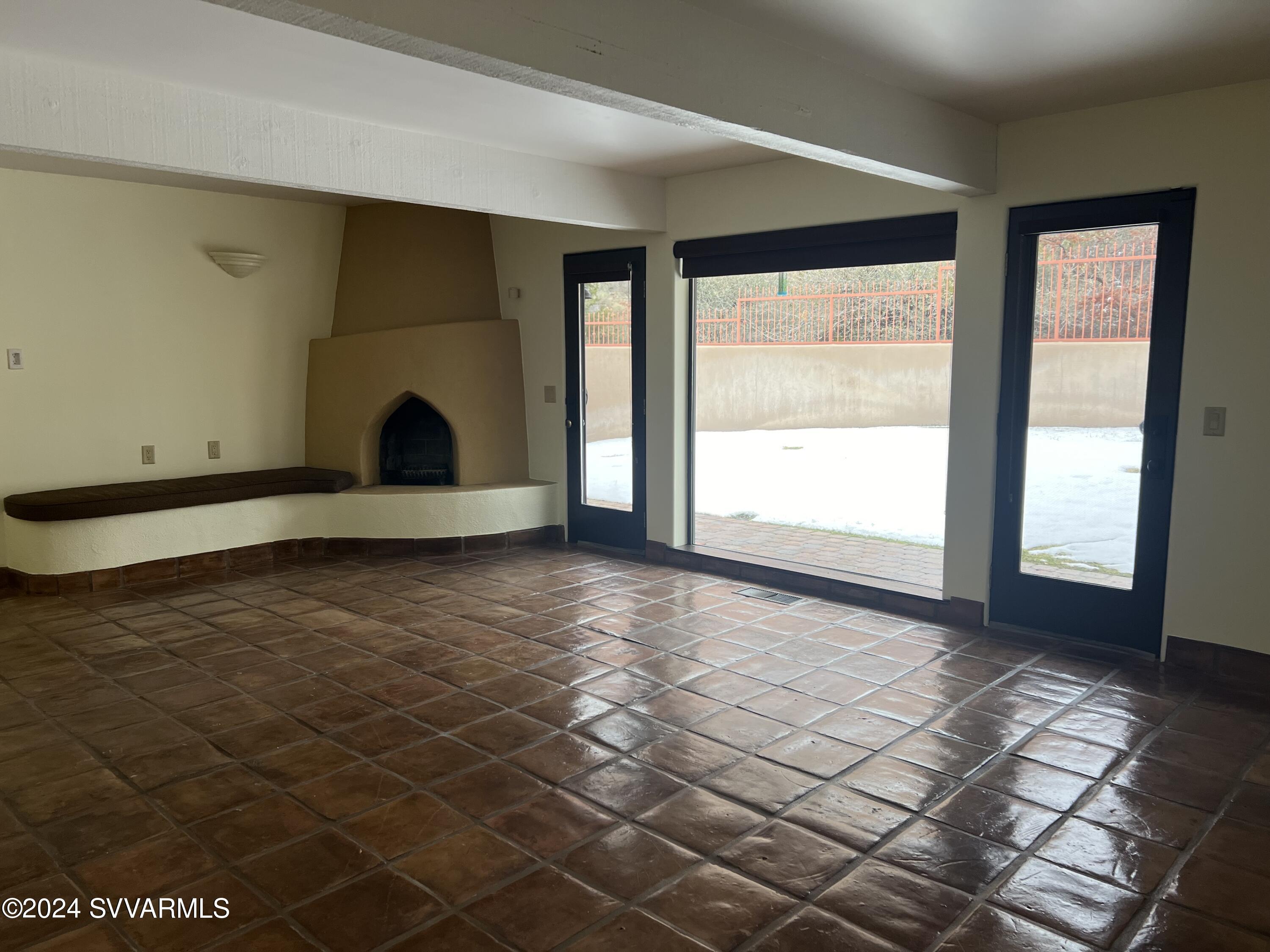 985 Rodeo Road Sedona, AZ 86336 - Photo 4 of 12 a view of an empty room with a window