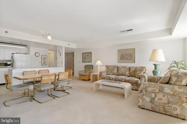 a living room with furniture and a couch