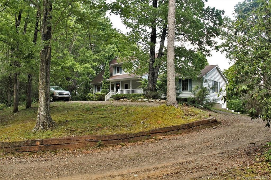185 Davis Creek Road Murphy, NC 28906 - Photo 2 of 48 a view of a house with a yard garage and trees