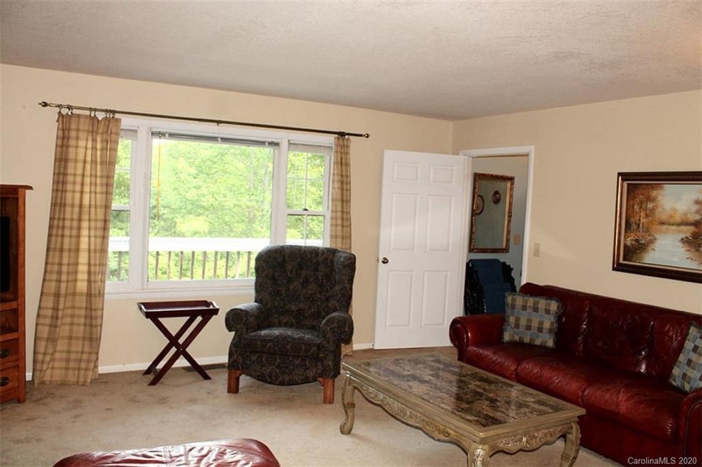 185 Davis Creek Road Murphy, NC 28906 - Photo 18 of 48 a living room with furniture and a window
