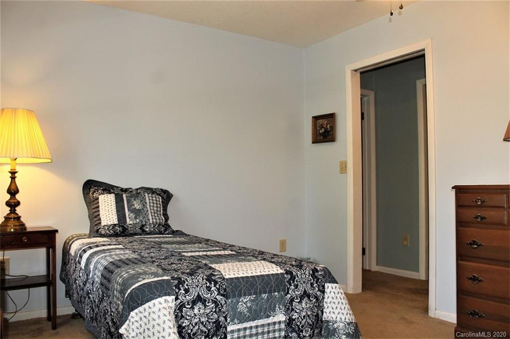 185 Davis Creek Road Murphy, NC 28906 - Photo 21 of 48 a bedroom with a bed and teddy bear on bed