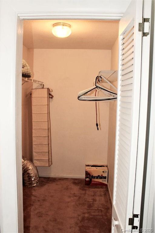 185 Davis Creek Road Murphy, NC 28906 - Photo 26 of 48 a view of a room with rack on the wall and a window