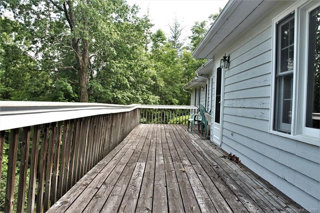 185 Davis Creek Road Murphy, NC 28906 - Photo 45 of 48 a balcony with wooden floor in front of it
