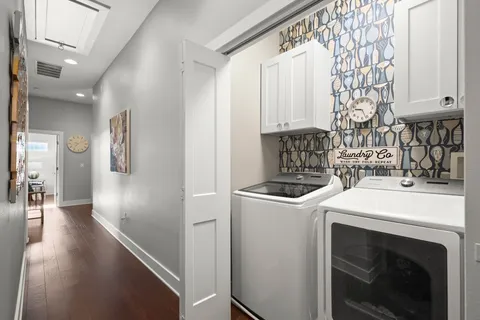 a kitchen with a stove and a sink