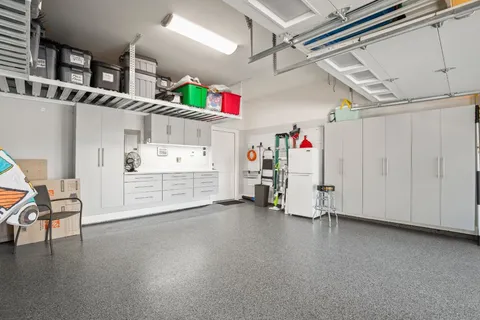 a view of a storage & utility room with toys