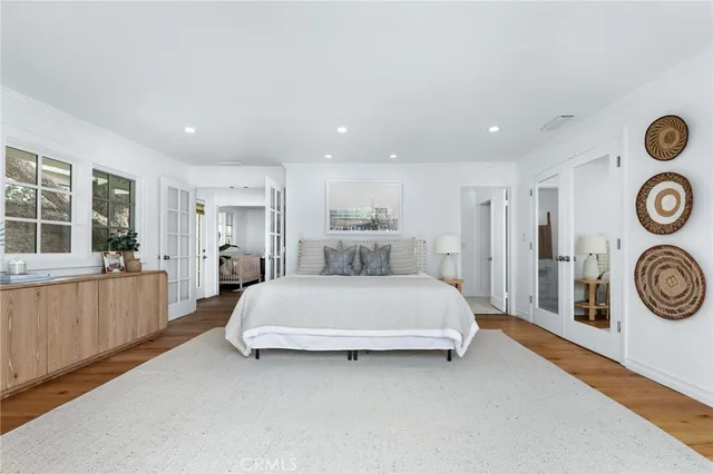 a bed room with a bed and a window