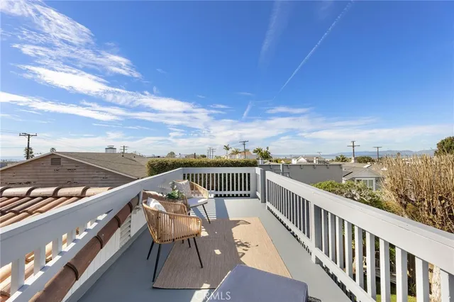 a view of a roof deck with couches