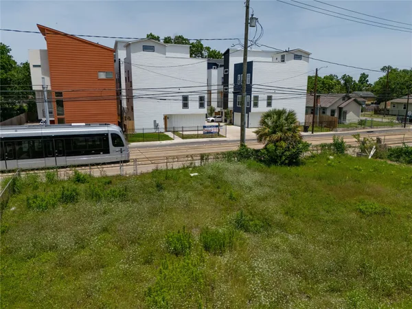 a view of swimming pool with a yard