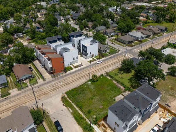 an aerial view of a house with a garden
